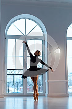 ballerina in black leotard and tutu skirt