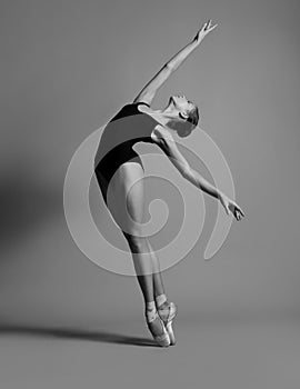 Ballerina in a black swimsuit