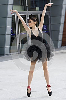 Ballerina in black tutu outdoor