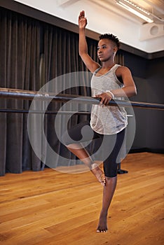 Ballerina, dancer and black woman stretching in studio for balance, wellness and theatre performance. Creative dance