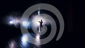 Ballerina dancing in slow motion. Dolly. Silhouette. HD.