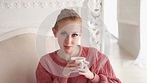Ballerina drinking tea