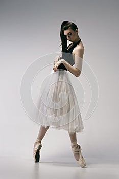 ballerina improvises in a photo studio