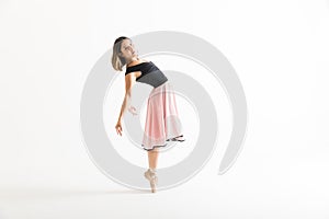 Ballerina Performing Backbend On White Background