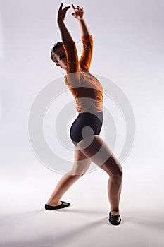 Ballet ballerina in pirouette end position