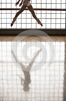 Ballerina Practicing In Rehearsal Room