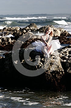 Ballerina on rocks