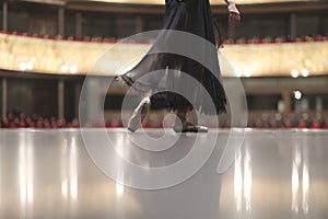 Ballerina`s feet in pointe shoes