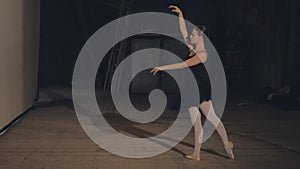 Ballerina stretching before going on stage