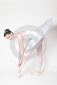 Ballerina Tying her Shoe