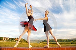 Ballerinas on a wall photo