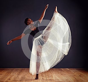 Ballet, black woman and ballerina in studio for dance routine, training and performance. Contemporary, dancing and young