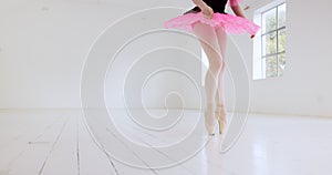 Ballet, dance and dancer studio with a student getting ready for fitness and workout in a studio. Ballerina performance