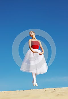 Ballet dancer on beach