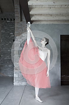 Ballet dancer makes warm up before performance