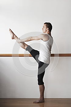 Ballet Dancer Practicing At Bar