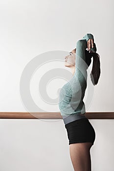 Ballet Dancer Practicing At Bar