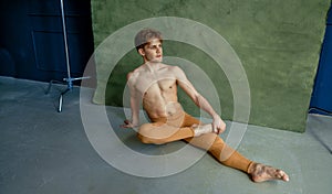 Ballet dancer sittiing on the floor, dancing class