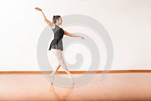 Ballet dancer walking on her toes