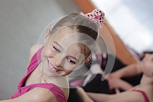 Ballet girl with friends during ballet lesson