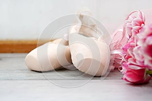 ballet, pointe shoes, tutu and bouquet of flowers