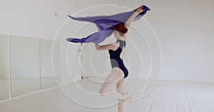 Ballet, studio and woman dance with fabric, training for performance art exhibition or abstract dancing during practice