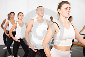 Ballet troupe in lesson in dance class photo