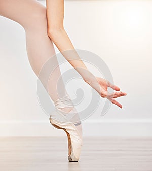 Ballet woman dancer hand, leg and foot in ballerina shoes. Pointe technique to balance body weight on toes, elegant arch