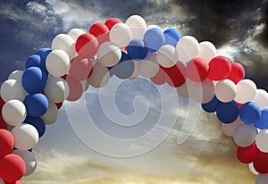 Balloon arch with evening sky background