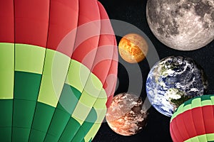 Balloon on a background of planets and space. Elements of this image furnished by NASA