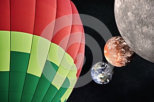 Balloon on a background of planets and space. Elements of this image furnished by NASA