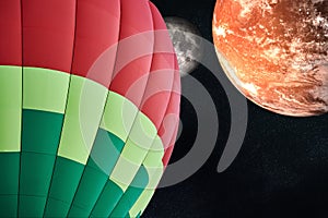 Balloon on a background of planets and space. Elements of this image furnished by NASA