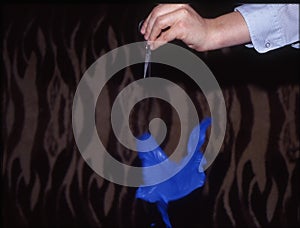 The balloon bursts explosively