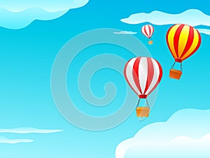 Balloon and clouds in blue sky