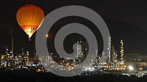 Balloon discover oil refinery on night lighting