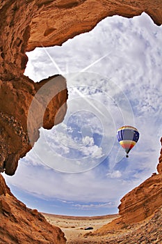 The balloon flies above slot-hole canyon