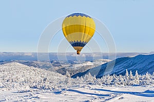 A balloon flies beautifully into the sky .