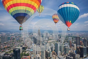 Balloon fly over Kuala Lumpur city skyline and skyscrapers