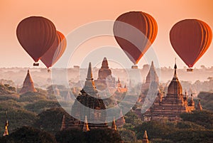 Balloon over plain of Bagan in misty morning, Myanmar photo