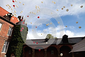 Balloons flying sky on wedding