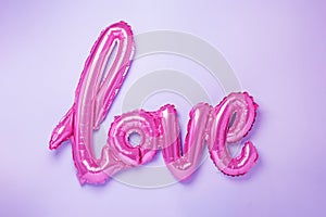 Balloons in the form of word Love in trendy neon colours. Valentines day celebration