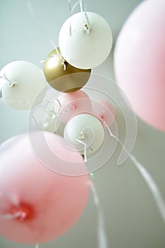 Balloons with helium flying in the room