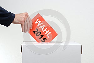 Ballot box with voting paper showing election 2015