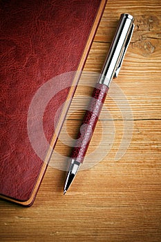 Ballpoint Pen and Notebook