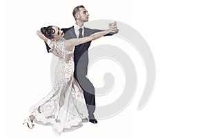 Ballrom dance couple in a dance pose isolated on white bachground