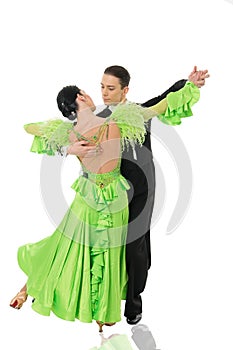 Ballroom dance couple in a dance pose isolated on white background. ballroom sensual proffessional dancers dancing walz