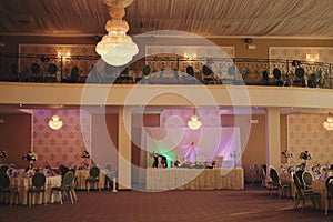 Ballroom with festive meals. restaurant arranged for the event