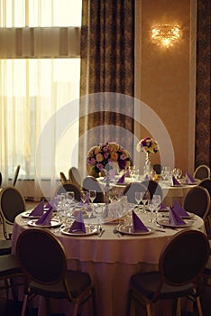 Ballroom with festive meals. restaurant arranged for the event