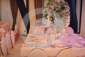 Ballroom with festive meals. restaurant arranged for the event