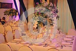 Ballroom with festive meals. restaurant arranged for the event